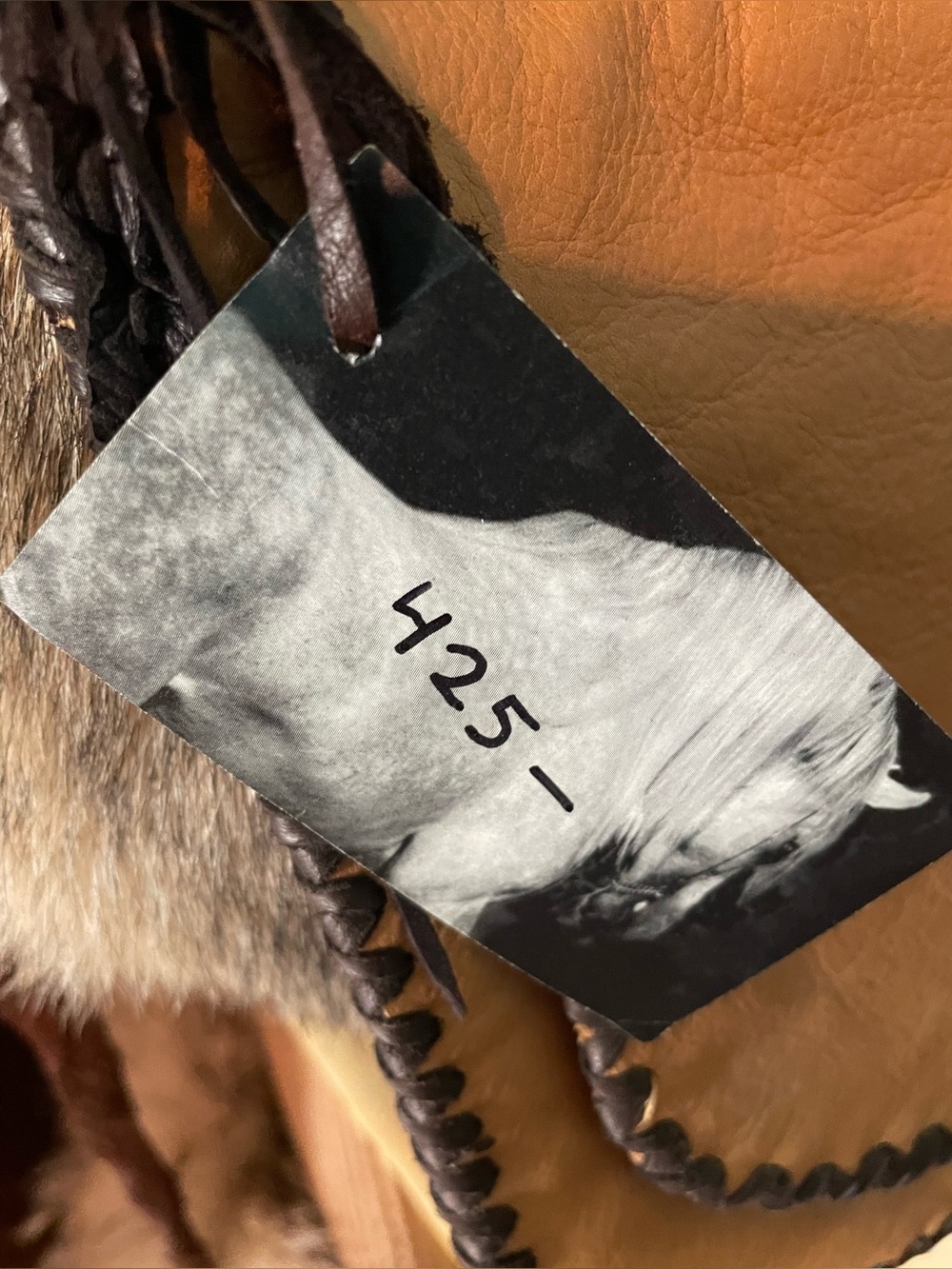 Brown Leather Bag with Braided Strap and Fur Accent